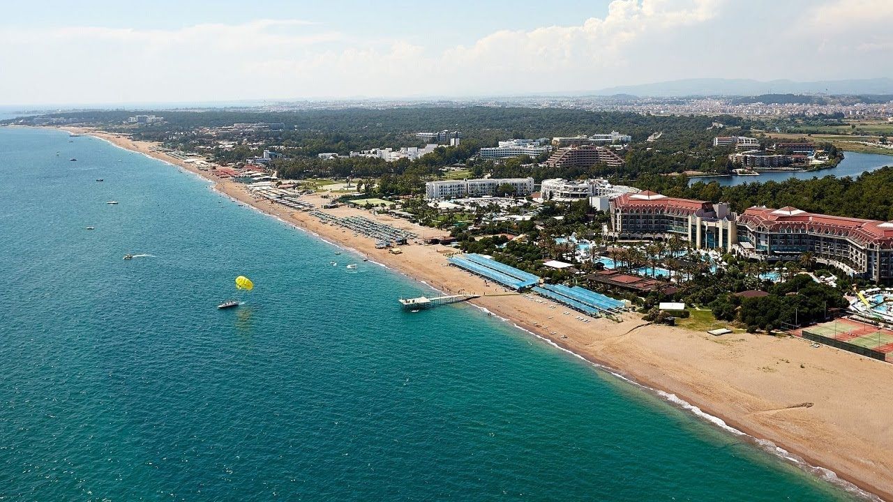 Golden sandy beach in Side with clear Mediterranean water